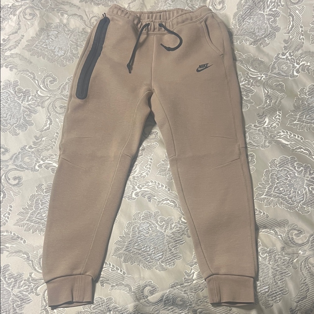 Like new worn twice Nike Tech Men Beige Joggers with Black Accents in small